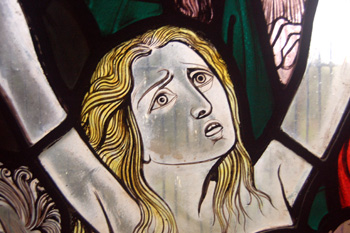 Detail from the group of damned on the west window November 2009